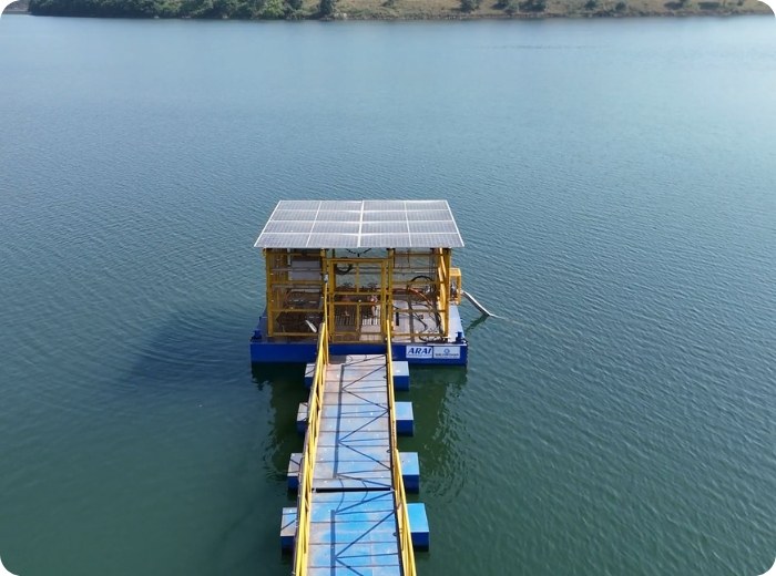Aerial view of a floating platform with solar panels